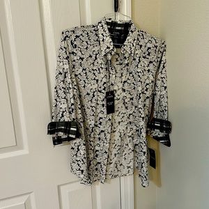 Beautiful long sleeve blouse. Elegant with flowers blank print.